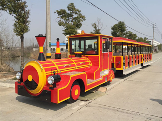 Antique trackless train with electric power