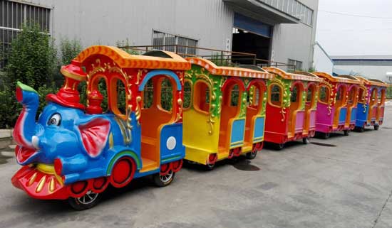 amusement park elephant train ride with 4 coaches