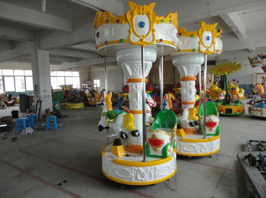 Kiddie carousel with 3 horses