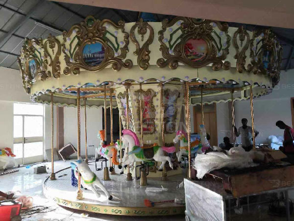 Indoor carousel rides in Ethiopia funfair