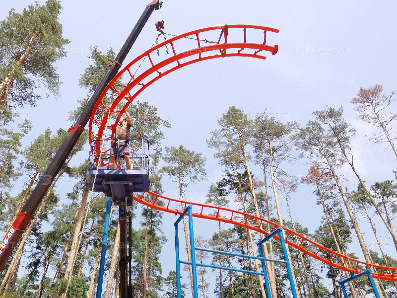 Installation of kiddie roller coaster ride